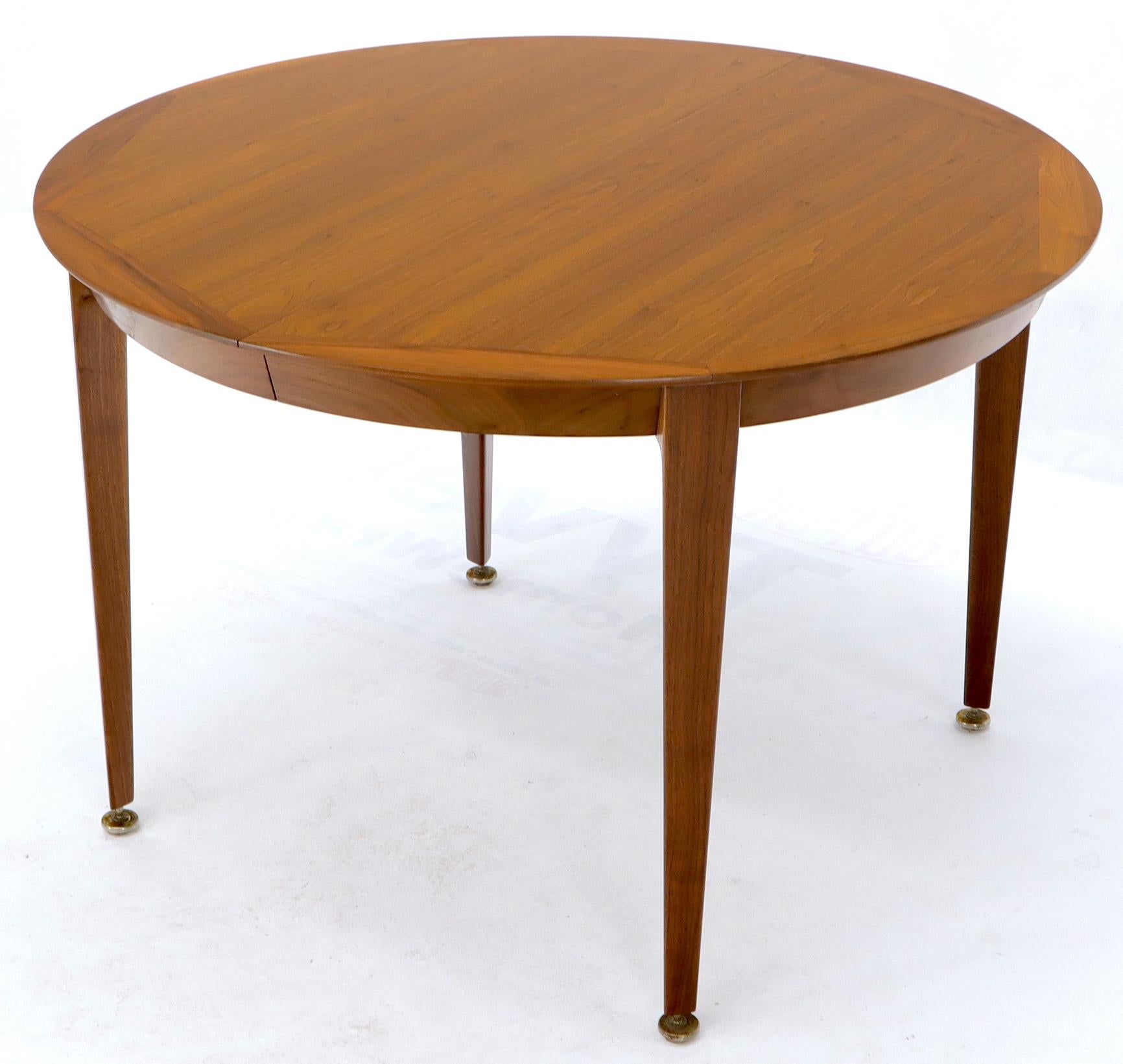 EstablishedLines Round Walnut Tapered Legs Dining Room Table with Two Extensions Boards