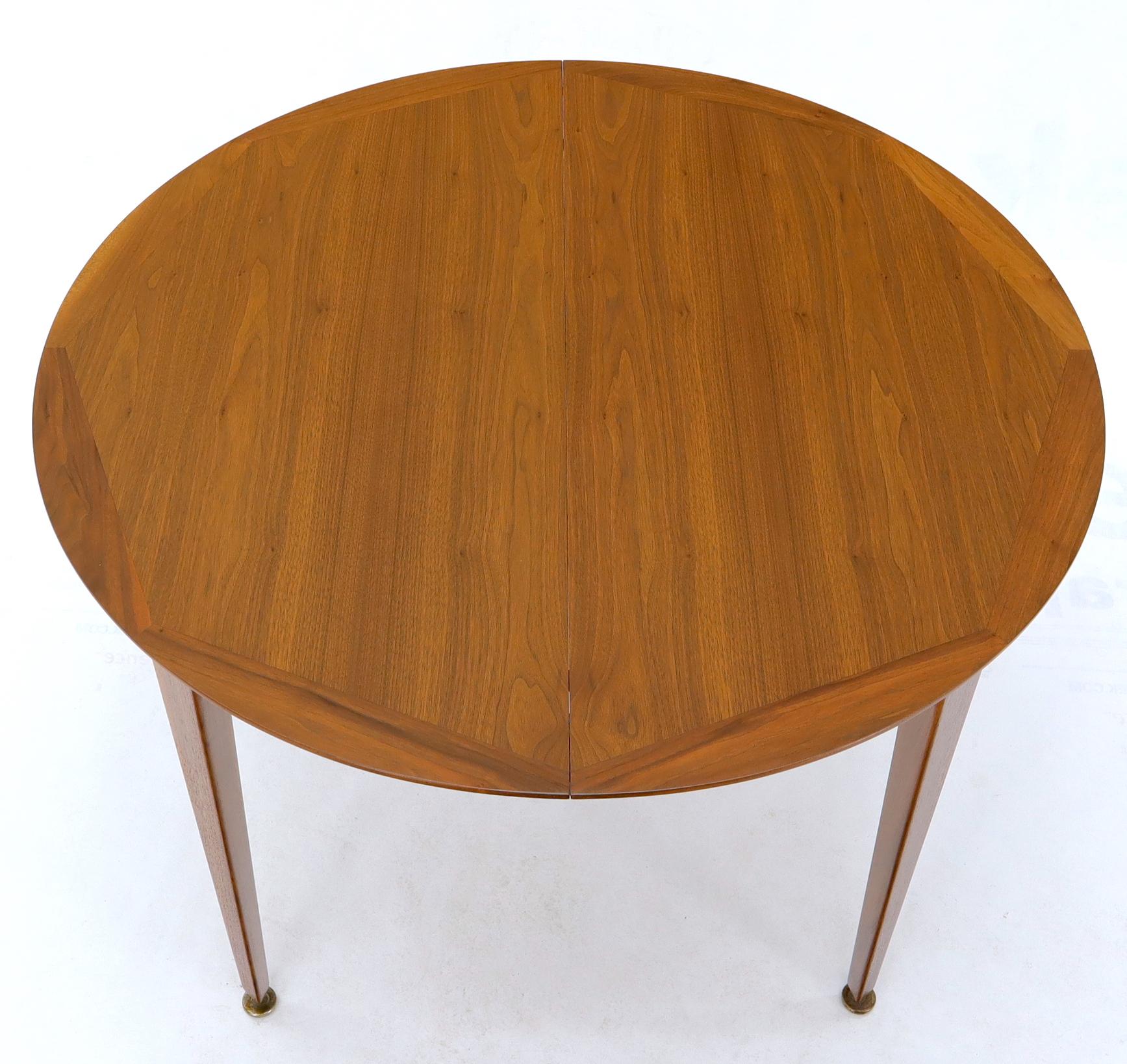 EstablishedLines Round Walnut Tapered Legs Dining Room Table with Two Extensions Boards
