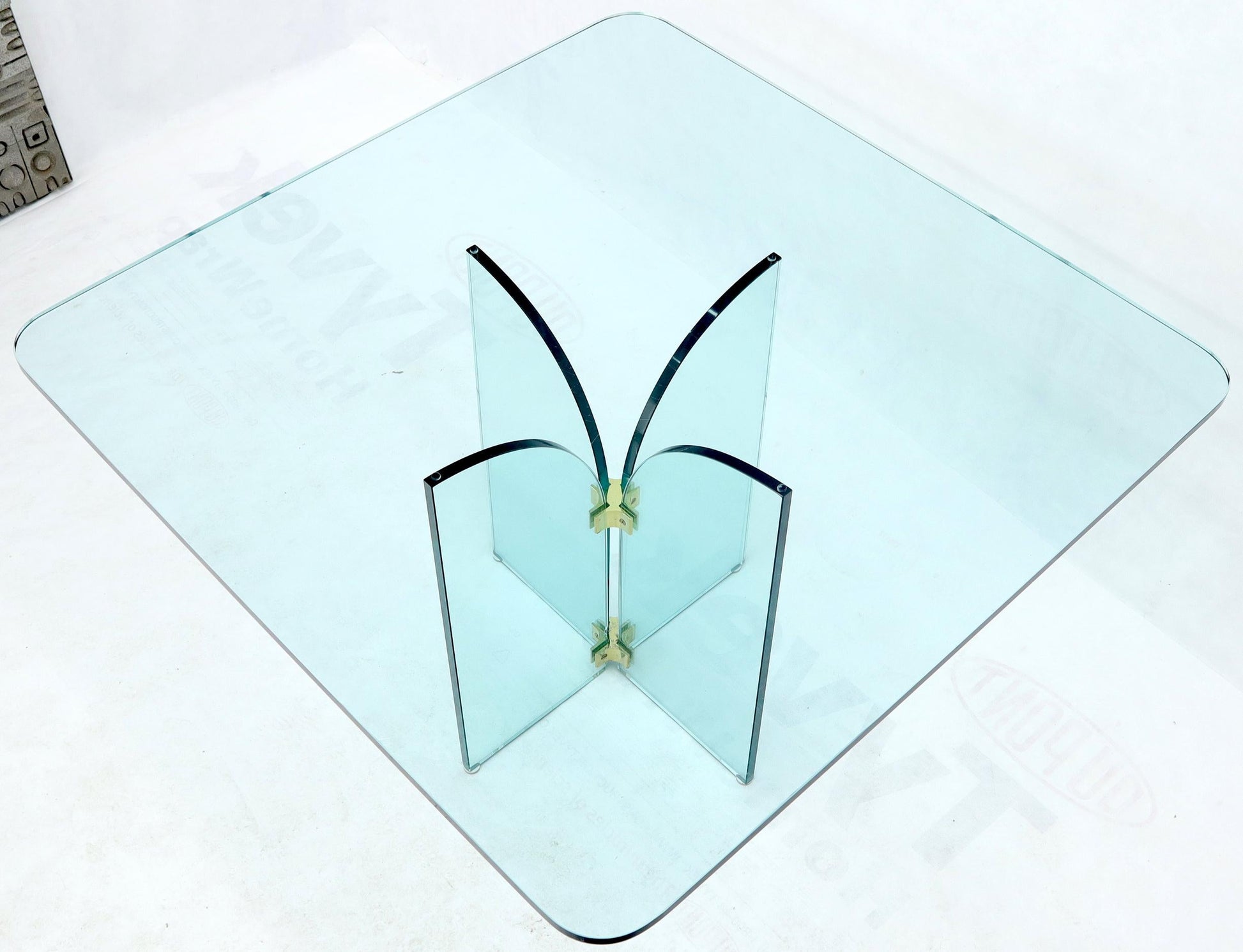 EstablishedLines Thick Rounded Square Glass Top Dining Table on Thick Glass Pedestal Base