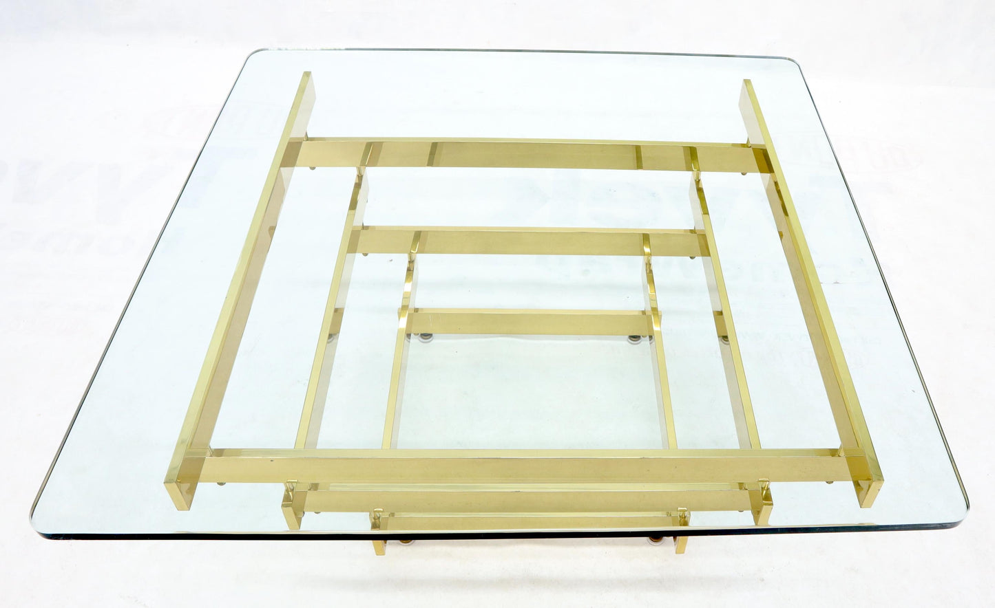 EstablishedLines Stacked Polished Lacquered Brass Bars Base Glass Top Square Coffee Table