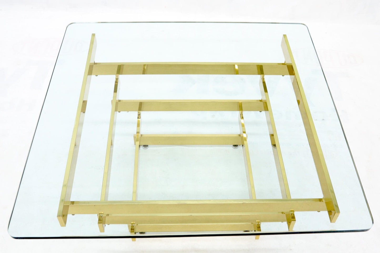 EstablishedLines Stacked Polished Lacquered Brass Bars Base Glass Top Square Coffee Table