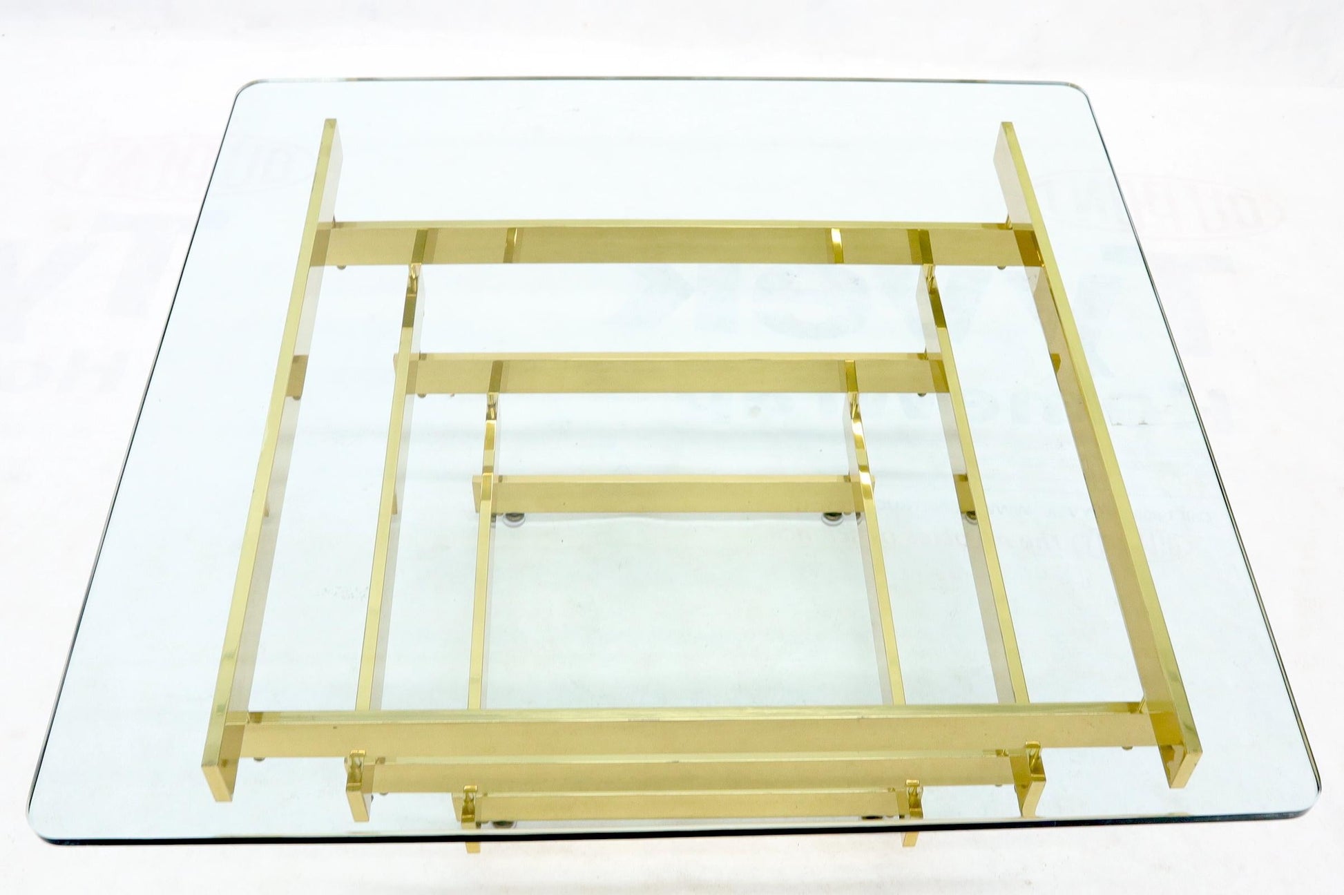 EstablishedLines Stacked Polished Lacquered Brass Bars Base Glass Top Square Coffee Table