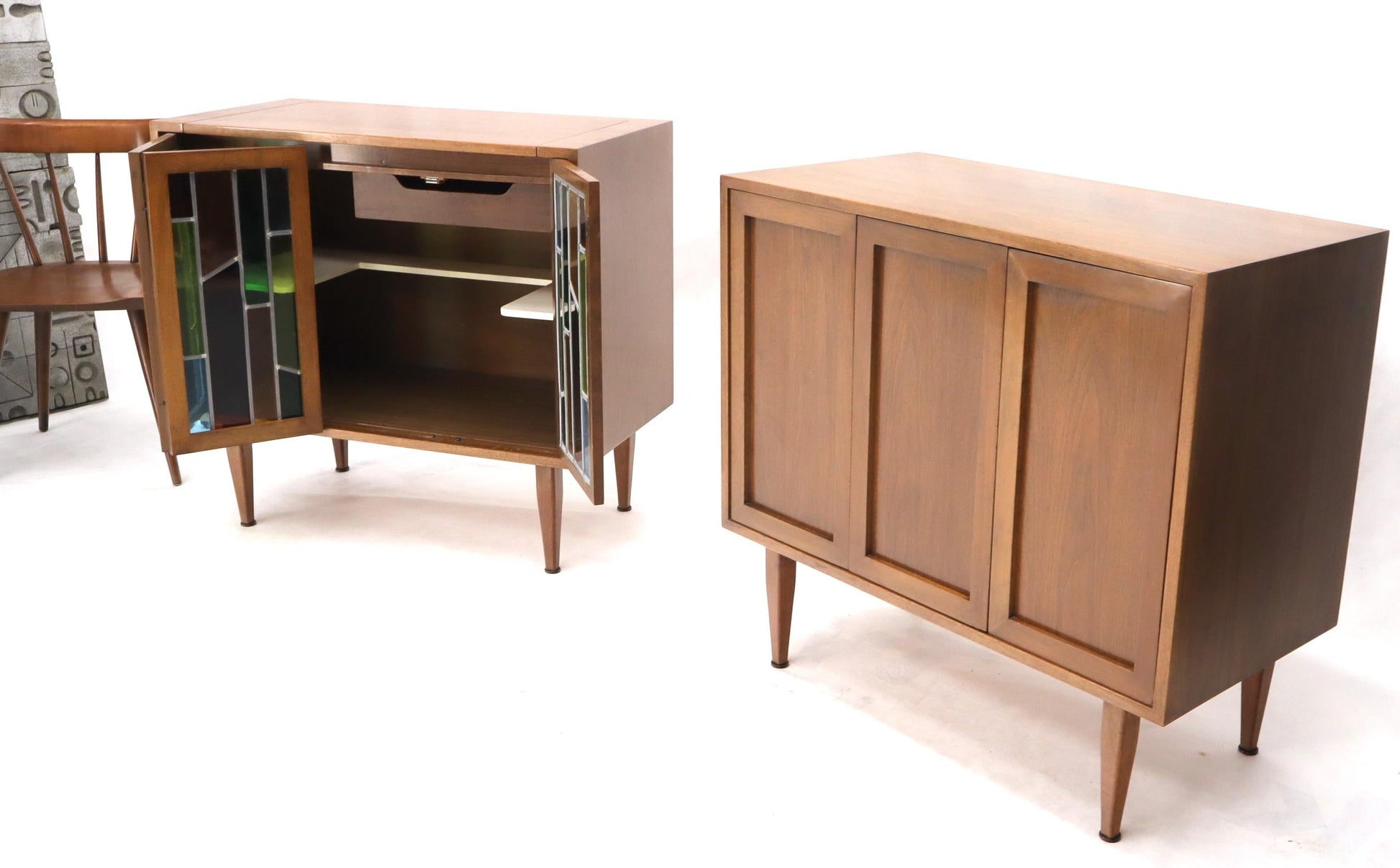 EstablishedLines Pair of Two Non Matching Pair Walnut Liquor and Storage Cabinets Stained Glass
