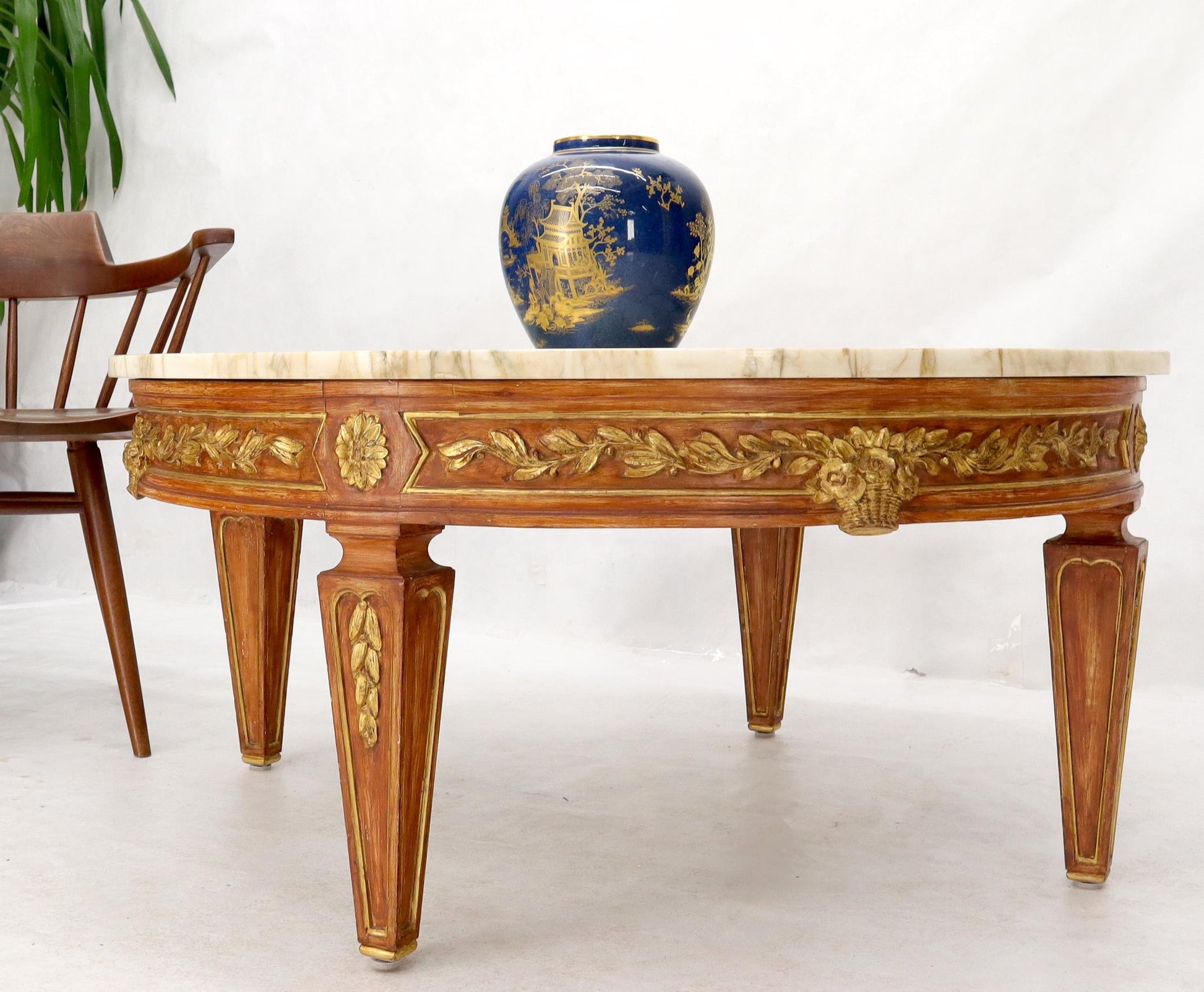 EstablishedLines Round Marble Top Ornate Carved Mahogany Base Coffee Table
