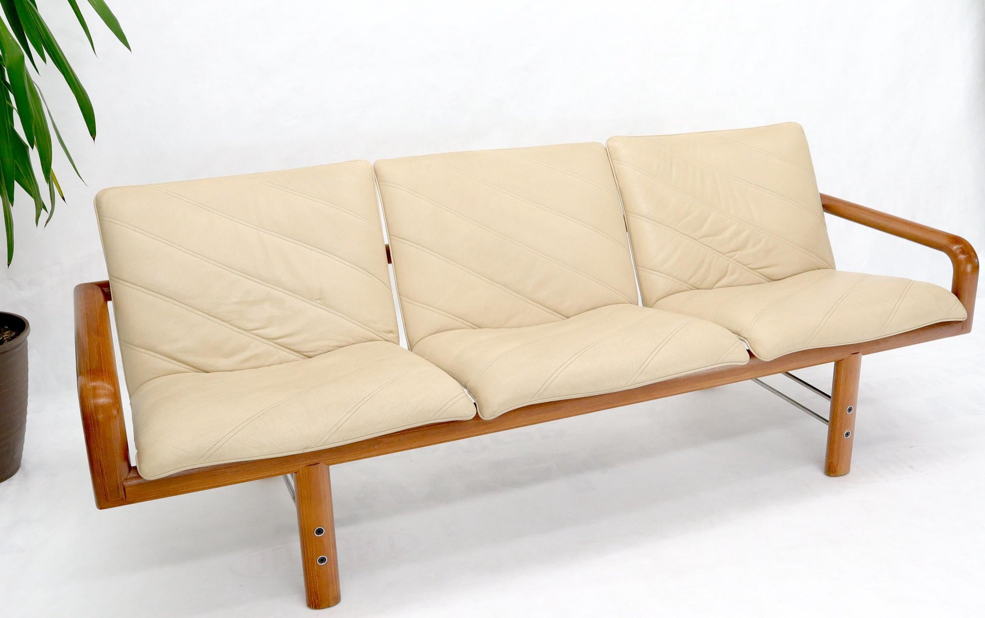 EstablishedLines Leather and Teak Midcentury Danish Modern Floating Sofa