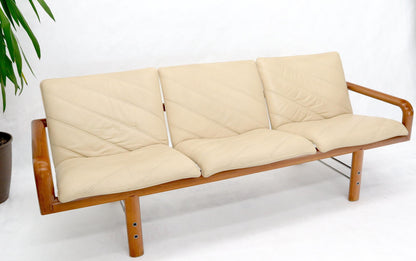 EstablishedLines Leather and Teak Midcentury Danish Modern Floating Sofa