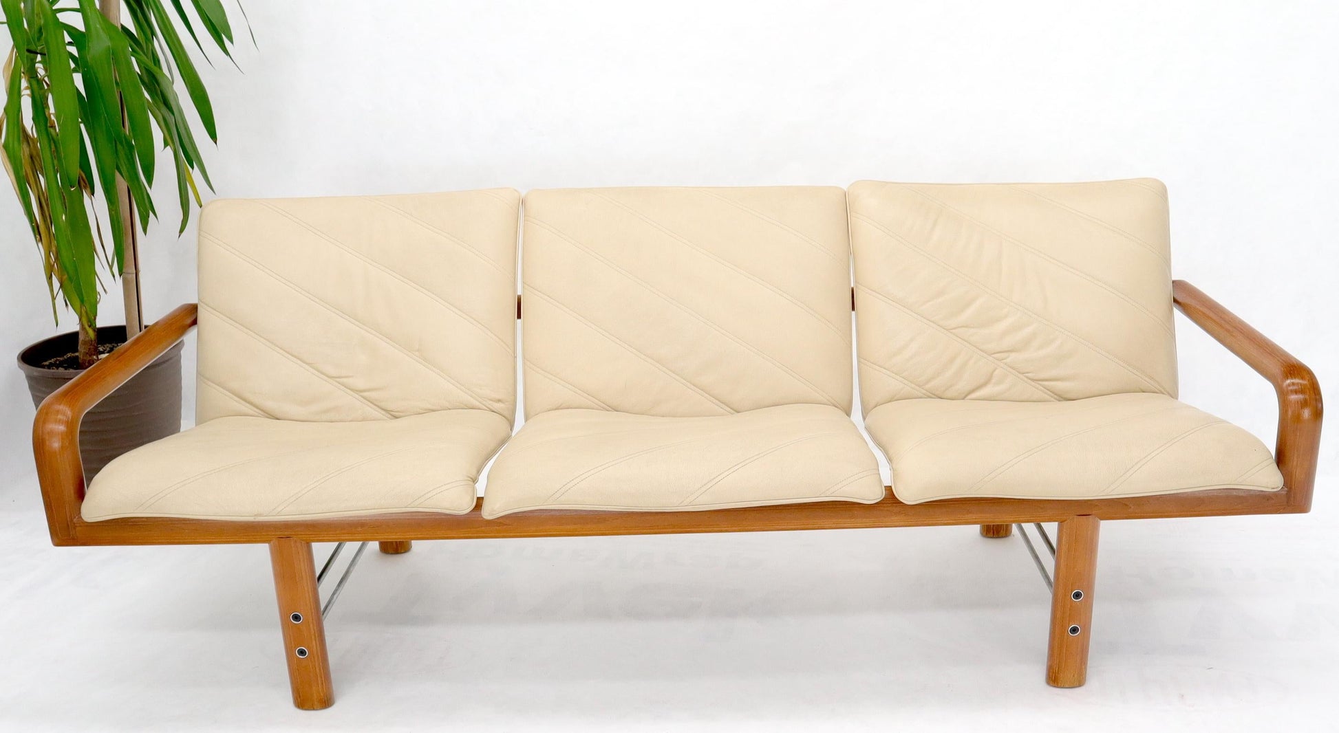 EstablishedLines Leather and Teak Midcentury Danish Modern Floating Sofa