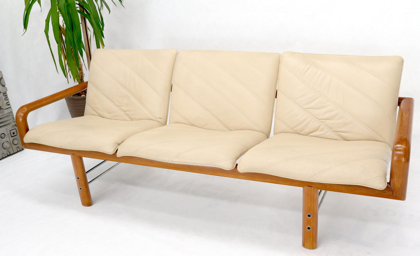 EstablishedLines Leather and Teak Midcentury Danish Modern Floating Sofa