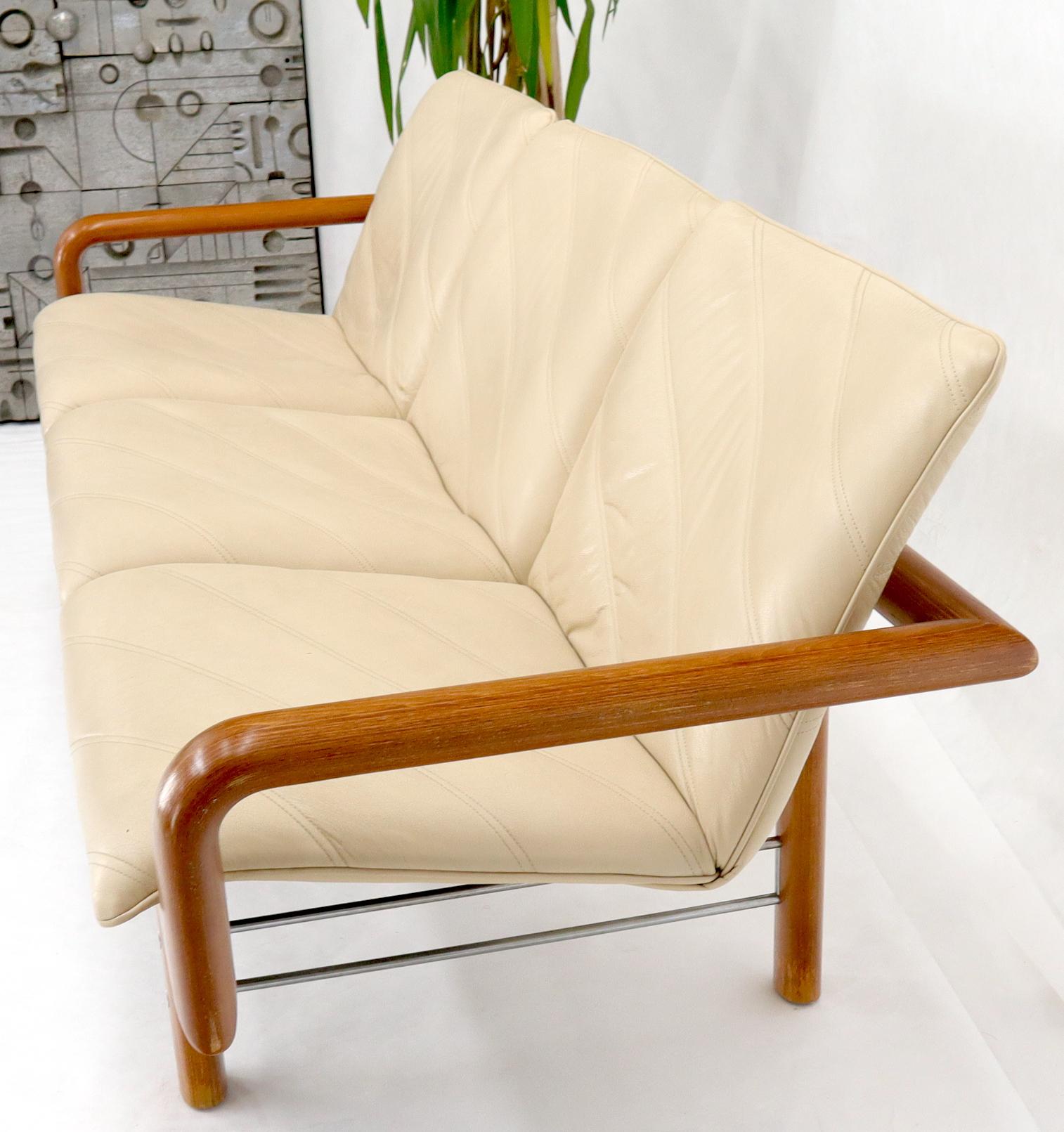 EstablishedLines Leather and Teak Midcentury Danish Modern Floating Sofa