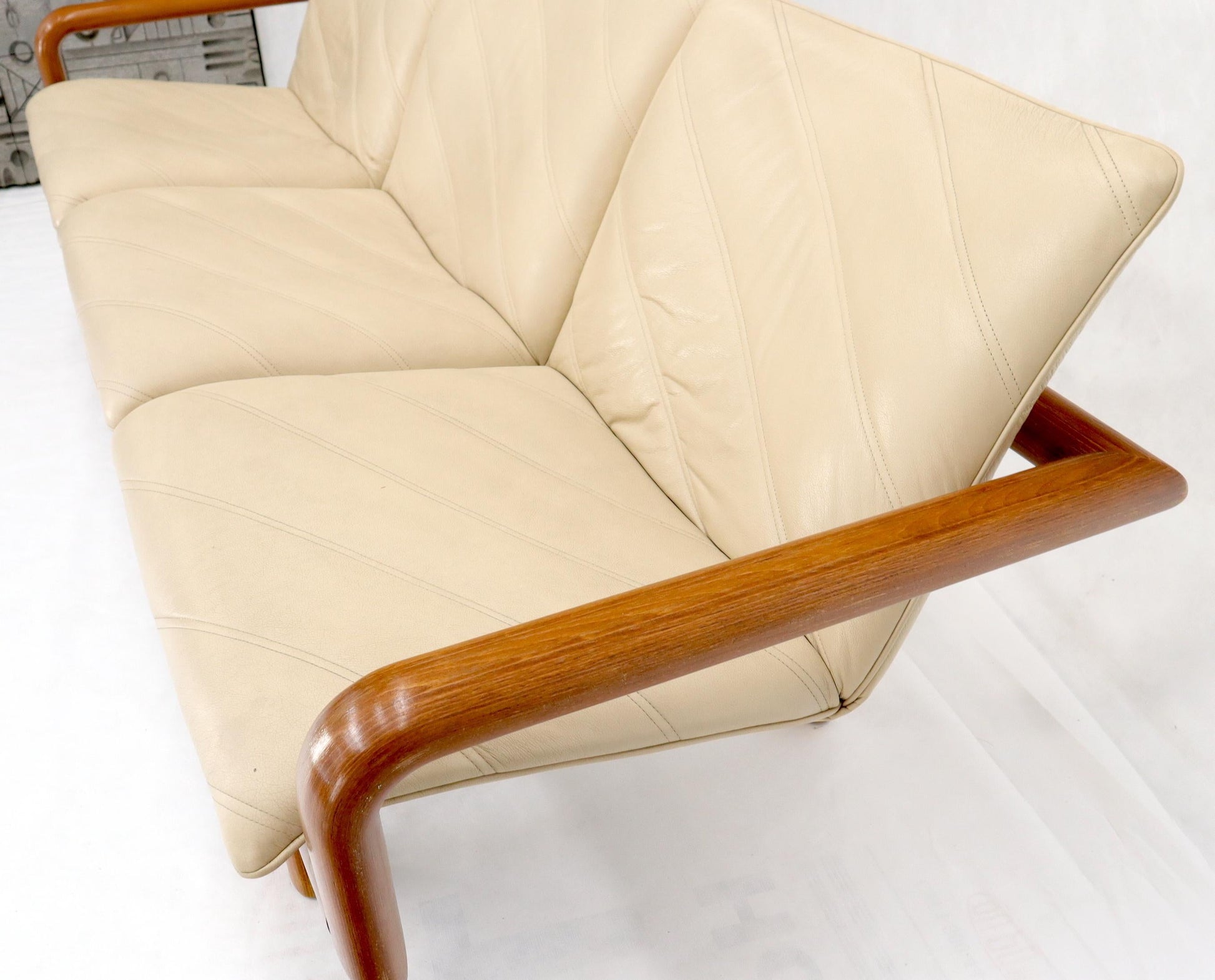 EstablishedLines Leather and Teak Midcentury Danish Modern Floating Sofa