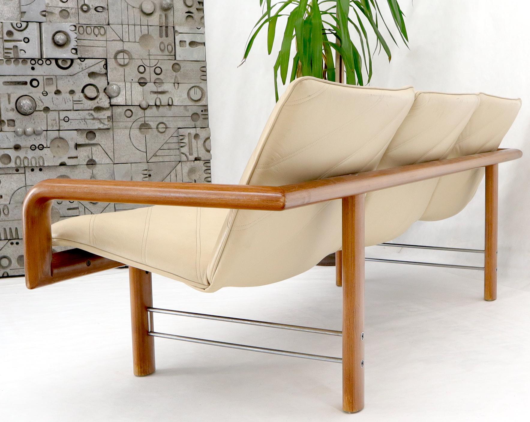 EstablishedLines Leather and Teak Midcentury Danish Modern Floating Sofa