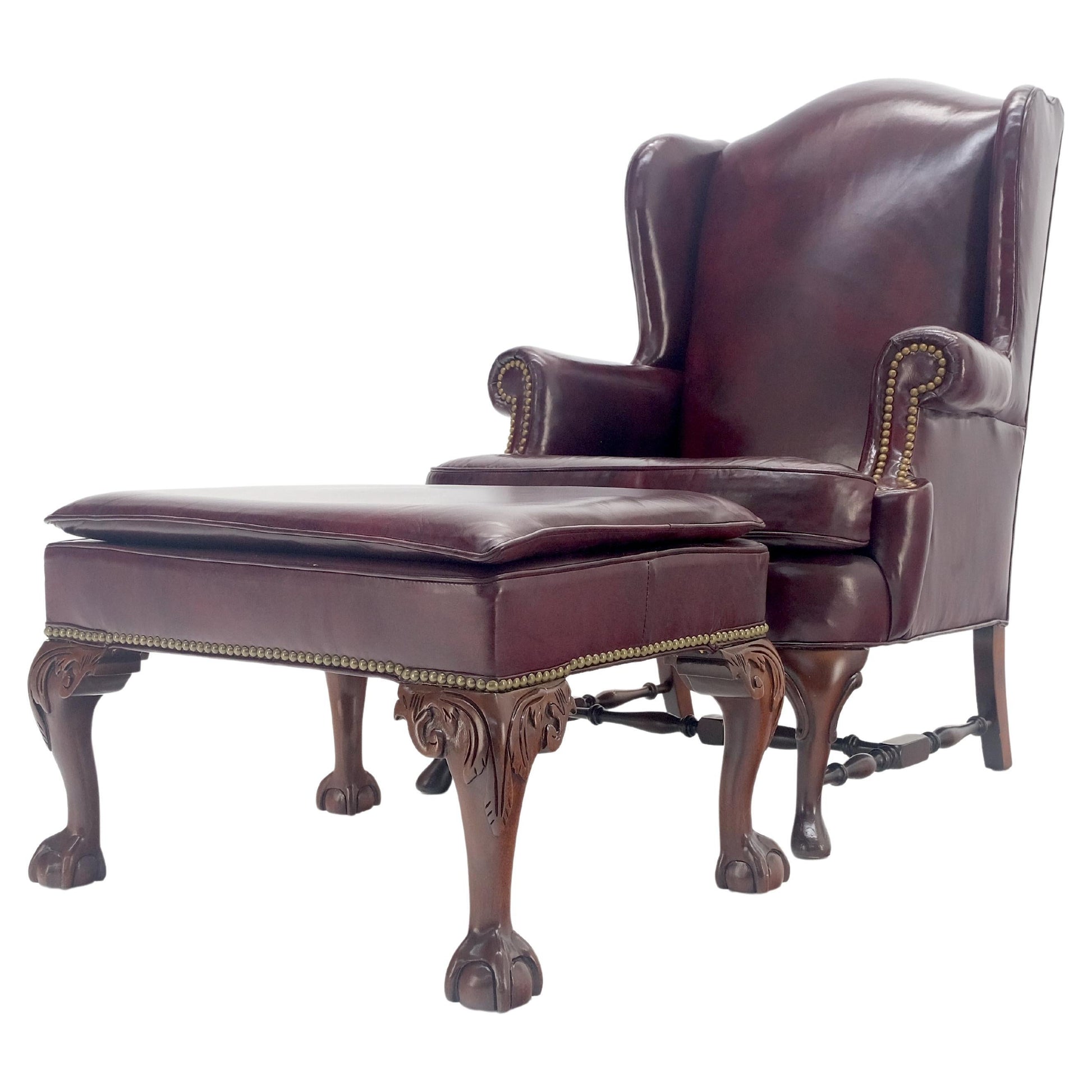 EstablishedLines Kindel Burgundy Leather Upholstery Carved Mahogany Legs Wingback Chair & Ottoman