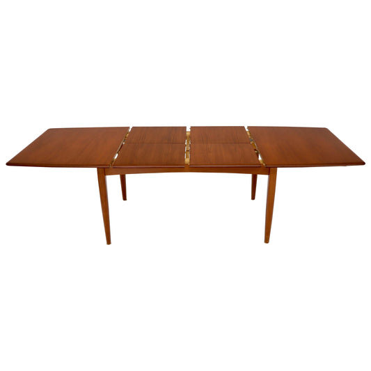 Danish Mid-Century Modern Teak Dining Table with Two Pop Up Self Storing Leaves