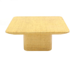 Square Cloth Covered Coffee Table Under Beveled Edge.