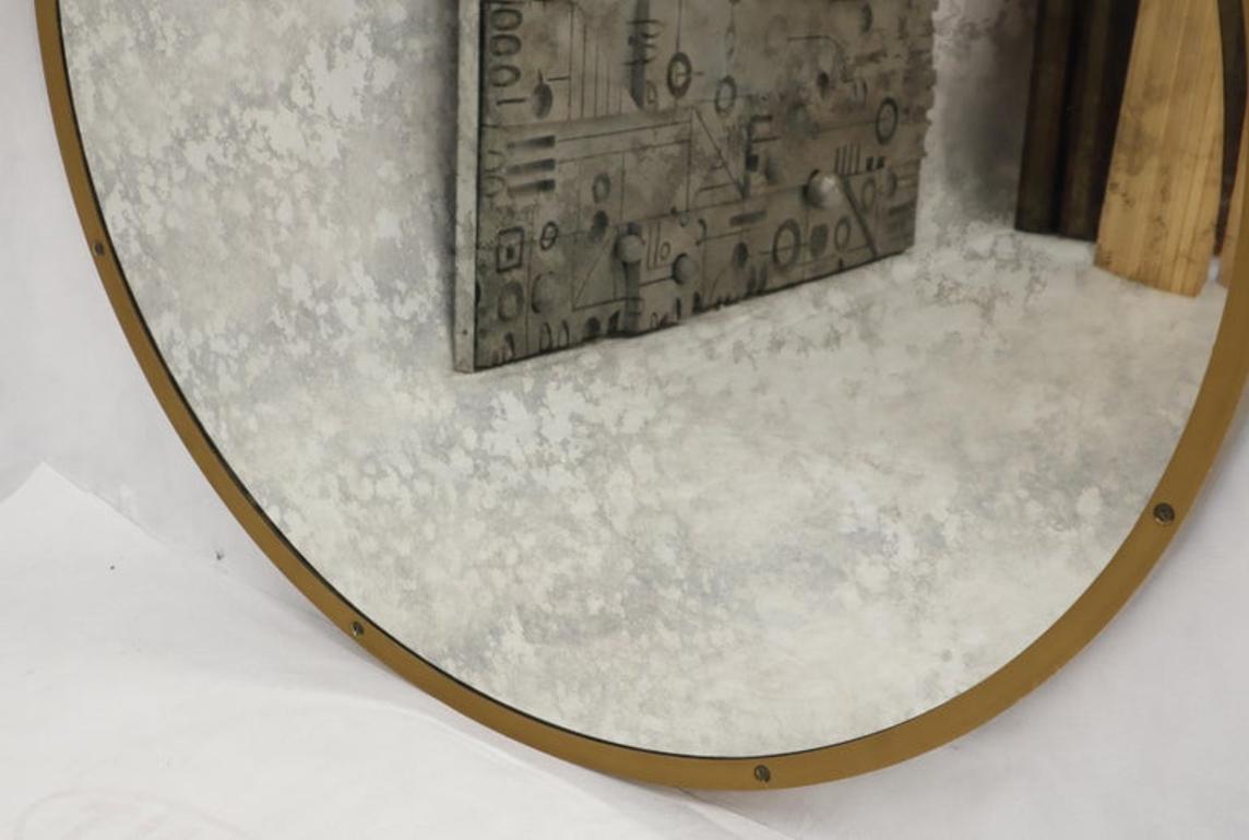 Large Round Metal Frame Wall Mirror with Screw Head Accents